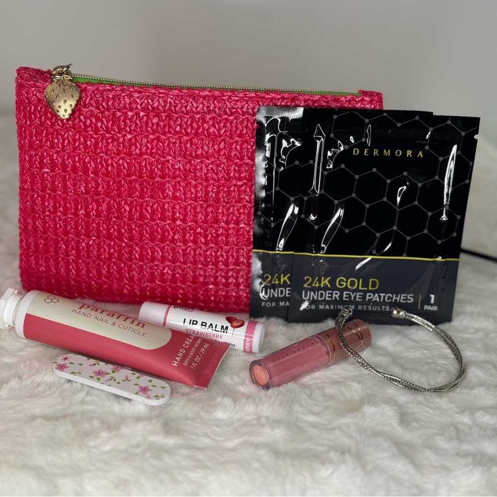 Pink Straw Glambag with zip closure & 6 beauty items and a silver toned bracelet